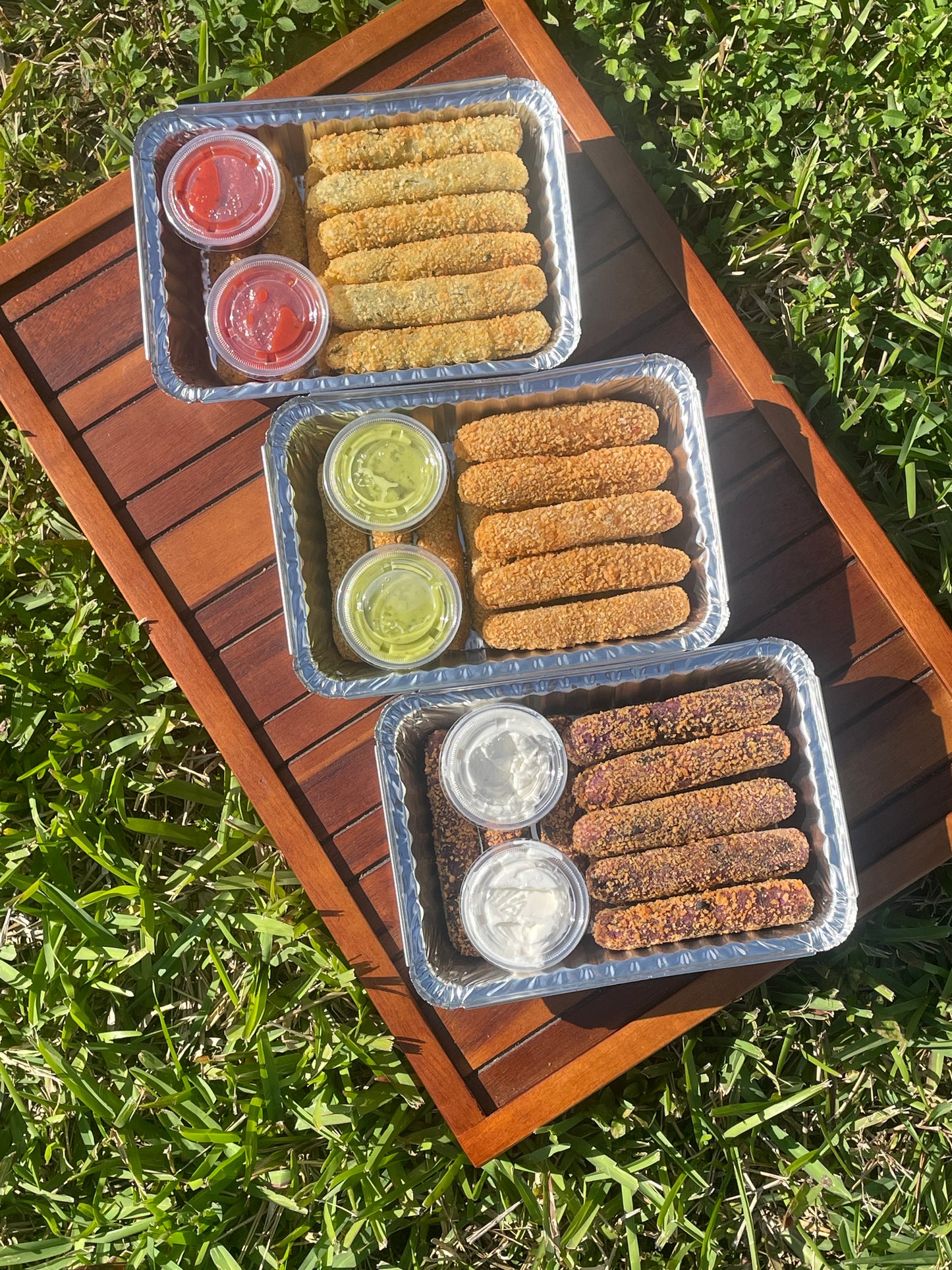Top to bottom:
Lemon Garlic Cilantro + Marinara Sauce
Traditional Cuban Style + Lime Cilantro Sauce 
Taro Cookies N’ Cream + Vanilla Icing