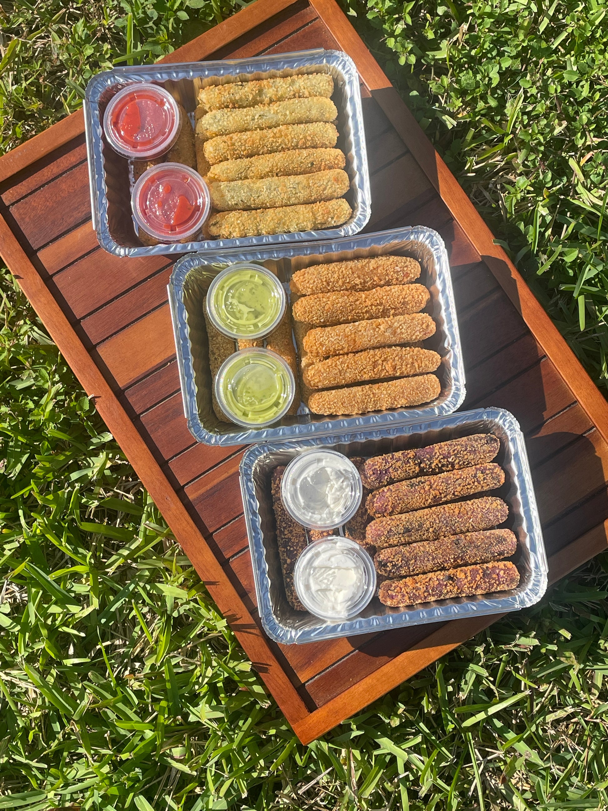 Top to bottom:
Lemon Garlic Cilantro + Marinara Sauce
Traditional Cuban Style + Lime Cilantro Sauce 
Taro Cookies N’ Cream + Vanilla Icing